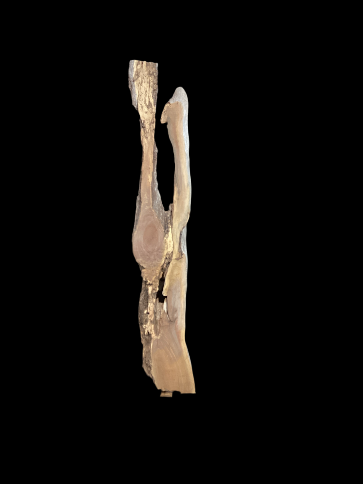 A walnut wood slab with a natural grain and unique river design on a black background.