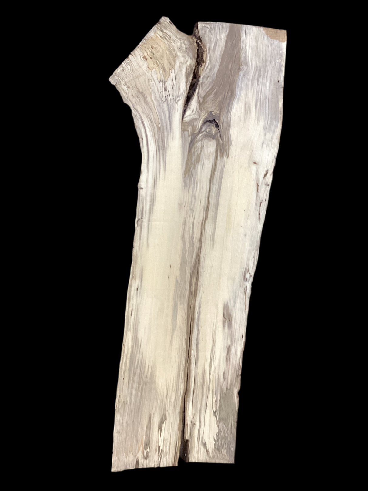 A handcrafted sculpture made from spalted hackberry wood, featuring unique natural splits and bark inclusions.
