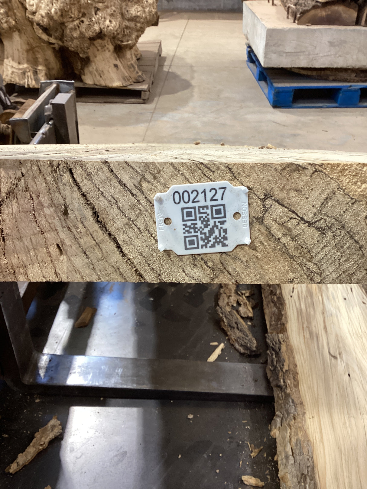 QR label attached to the edge of a Hackberry slab.