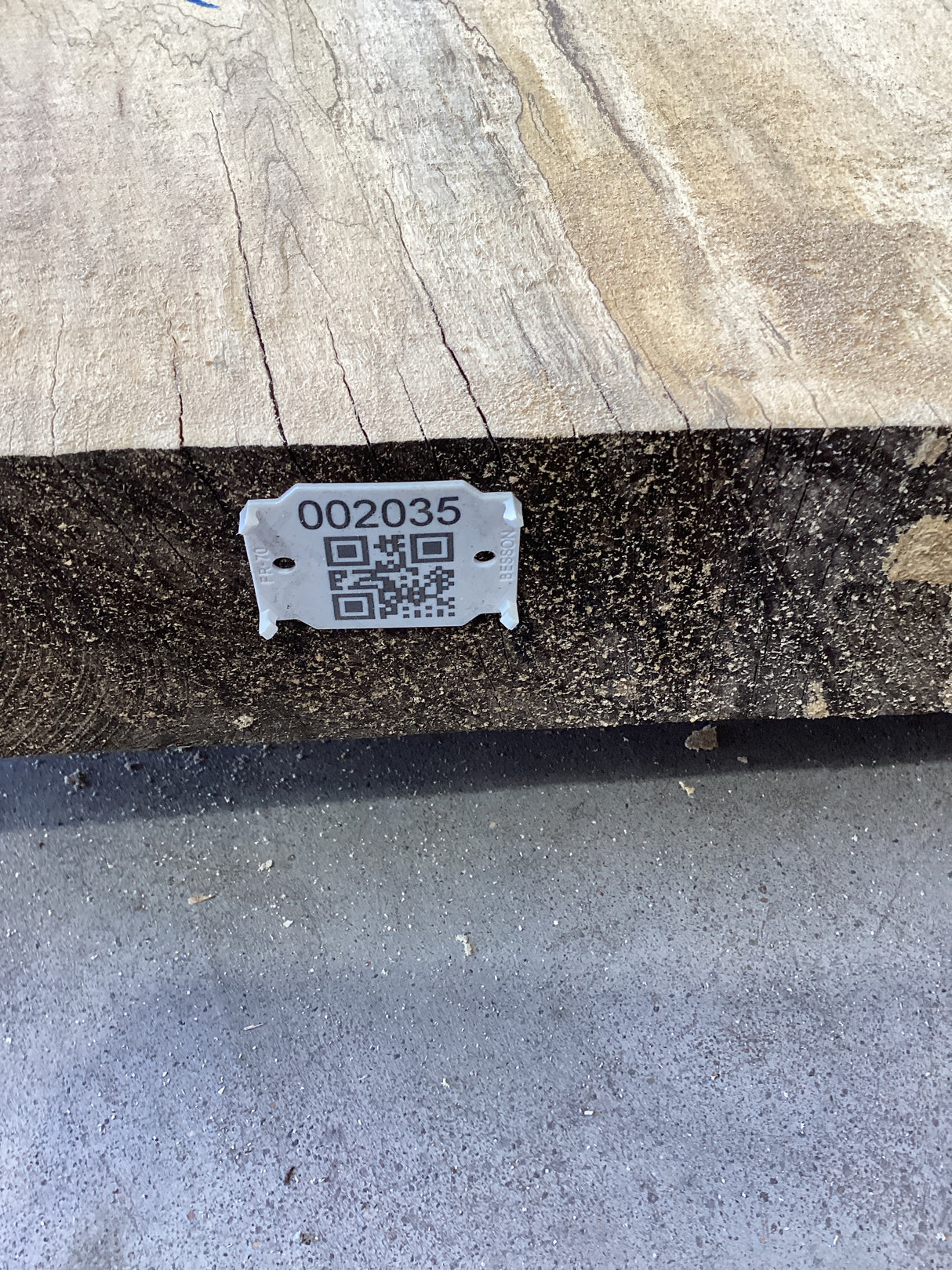 QR label attached to the edge of a Silver Maple slab.