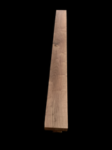 A walnut fireplace mantle with a natural finish, displaying the grain and color of the walnut wood.