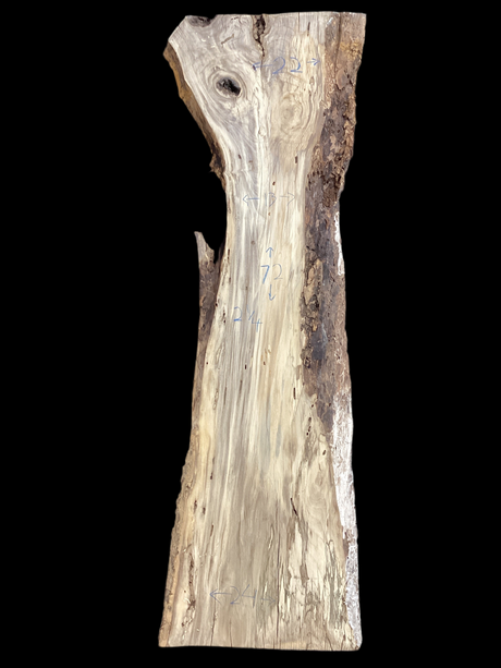 A table-sized slab of Hackberry wood with a prominent live edge, featuring a beige and brown color palette.