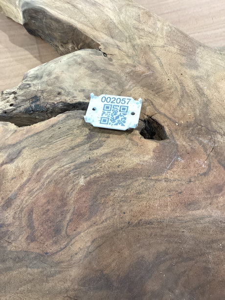 QR label attached to the walnut wood slab.