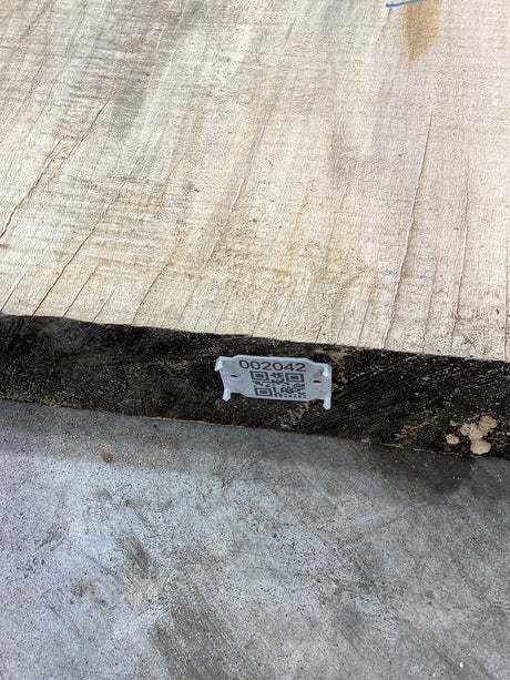 QR label attached to the edge of a Silver Maple slab.