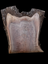 A close-up image of a walnut slab with a tiger-striped figure, indicating the natural grain of the wood.