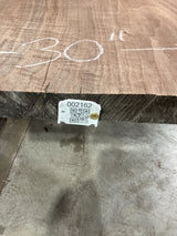 A walnut slab with visible grain patterns, marked with a measurement of 30 inches and a QR code.