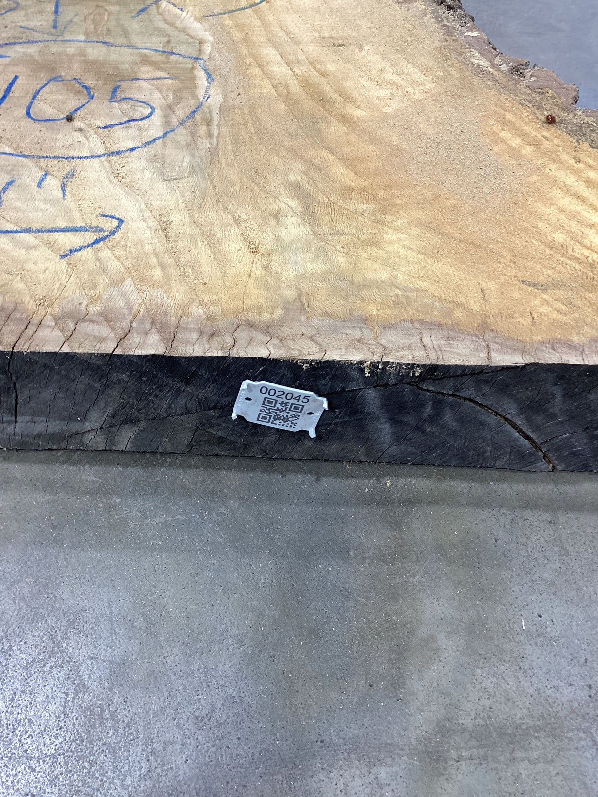 QR label attached to the edge of a Red Oak slab.