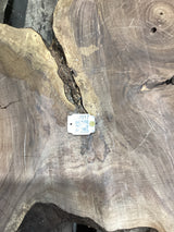 QR label attached to the walnut wood slab.