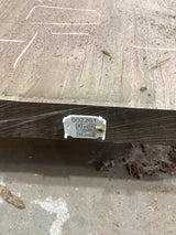 A walnut wood slab with a label that includes the identification number 002261.