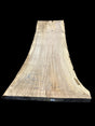 A beige-colored, solid-wood red oak slab with marked dimensions on it, indicating its size and shape.