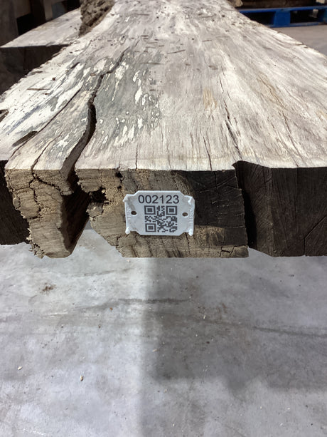 QR label attached to the edge of a Hackberry slab.