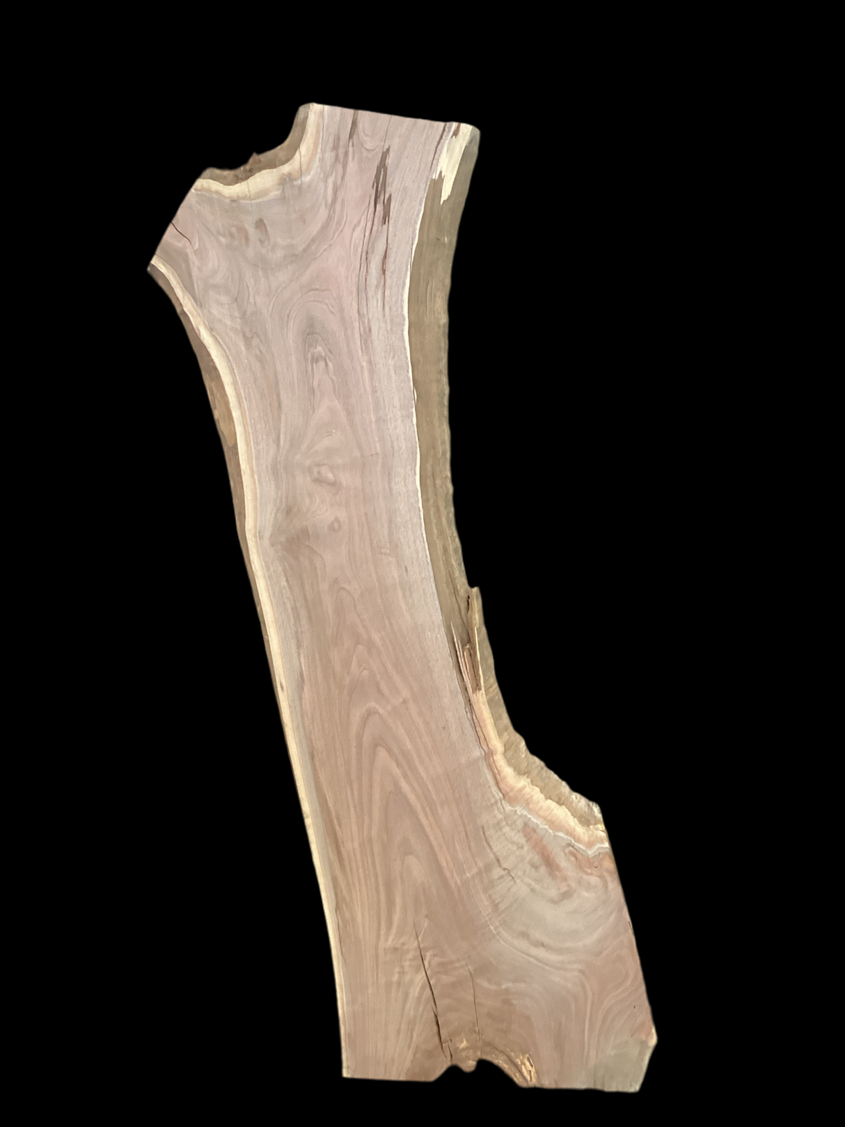 A short walnut slab with a black background.