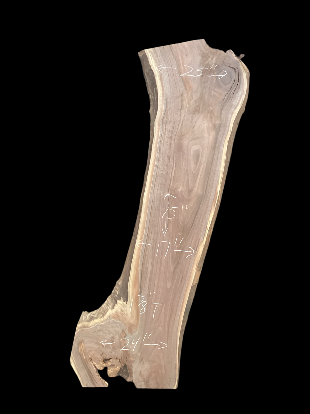 A short walnut slab with a black background.