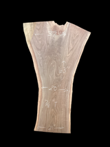 A large walnut slab with a black background.
