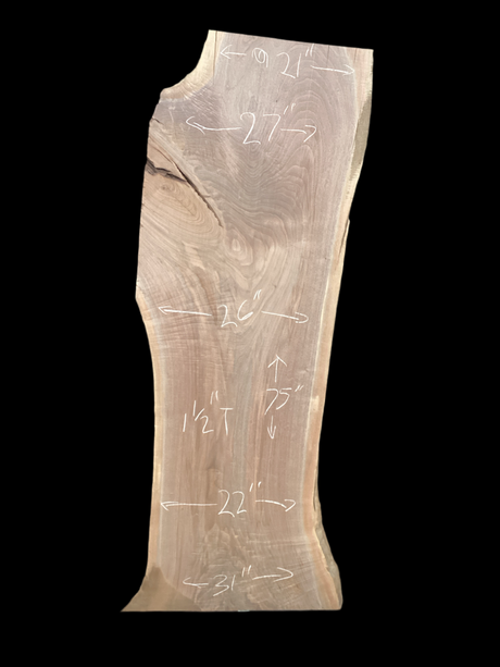 A short walnut slab with a black background. 