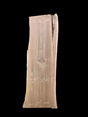 Large walnut wood slab with a black background.