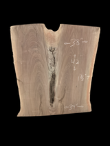 A short walnut slab with a black background. 