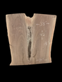A short walnut slab with a black background. 