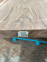 A walnut wood slab with visible natural grain patterns, marked with a measurement of 21' and a QR code.
