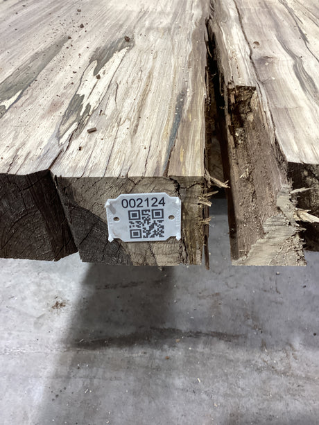 QR label attached to the edge of a Hackberry slab.