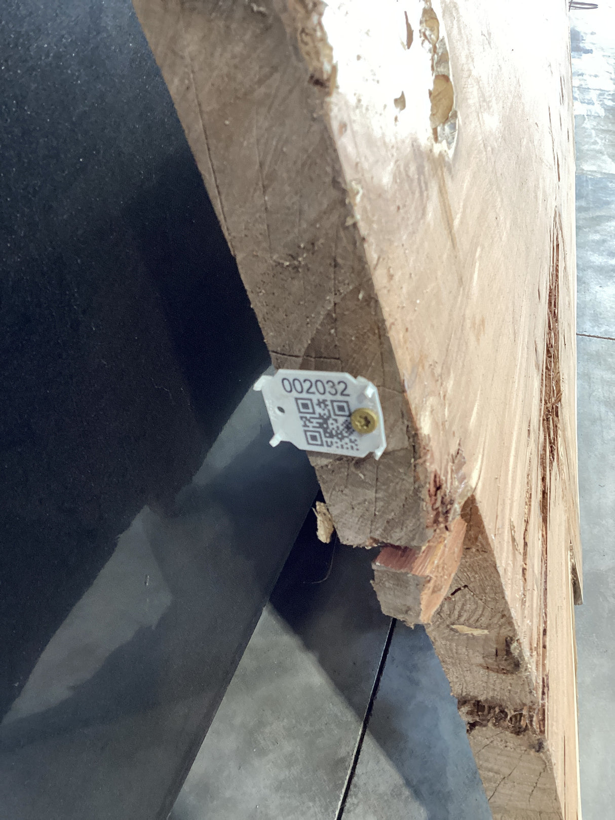 Aromatic eastern red cedar wood edge with QR code attached.