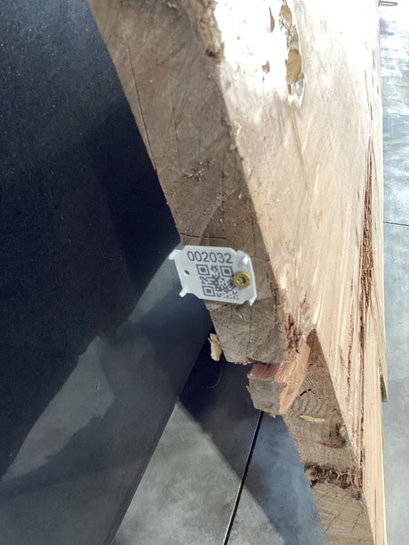 Aromatic eastern red cedar wood edge with QR code attached.