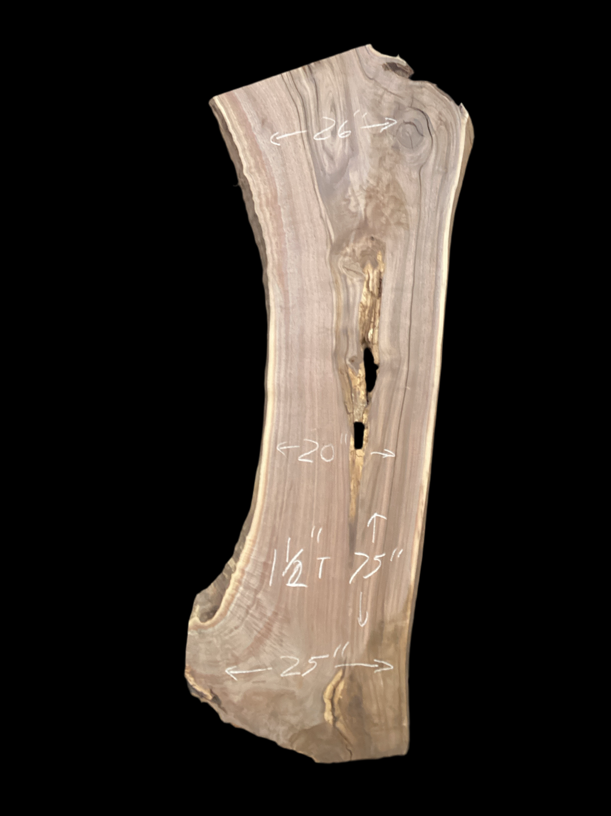 A short walnut slab with a black background.