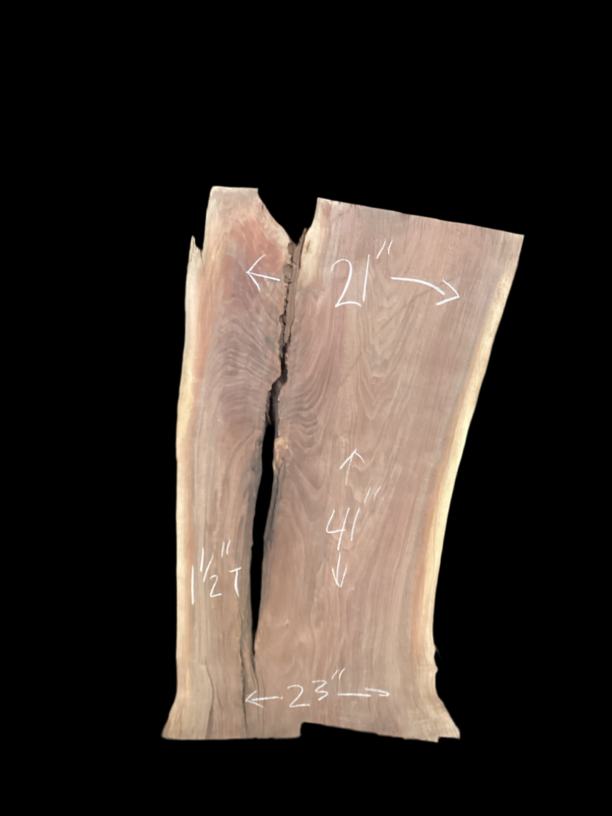 Large walnut wood slab with a black background.