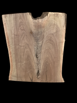 A short walnut slab with a black background. 