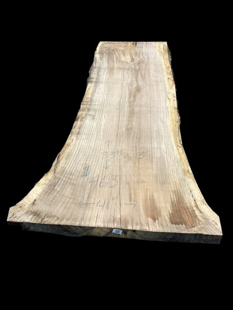 A beige-colored oak wood slab with visible wood grain, positioned on a plain background.