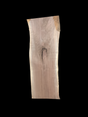 A short walnut slab with a black background. 