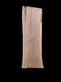 Large walnut wood slab with a black background.