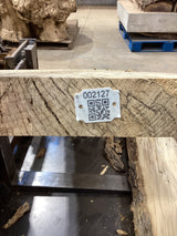 QR label attached to the edge of a Hackberry slab.