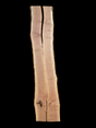 A long walnut wood slab with a split down the middle on a black background.