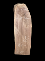 A short walnut slab with a black background.