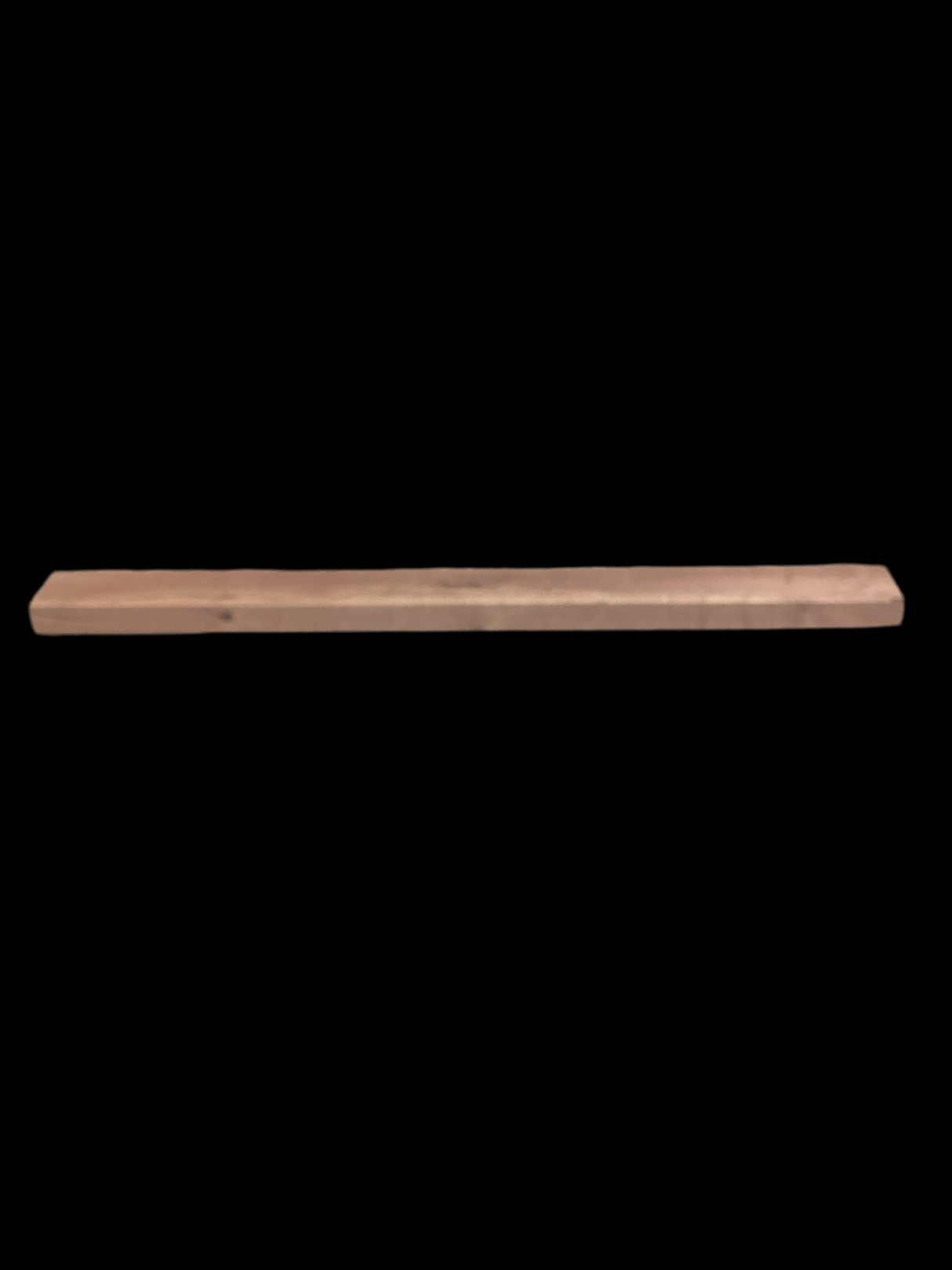 A walnut fireplace mantle with a natural finish, displaying the grain and color of the walnut wood.