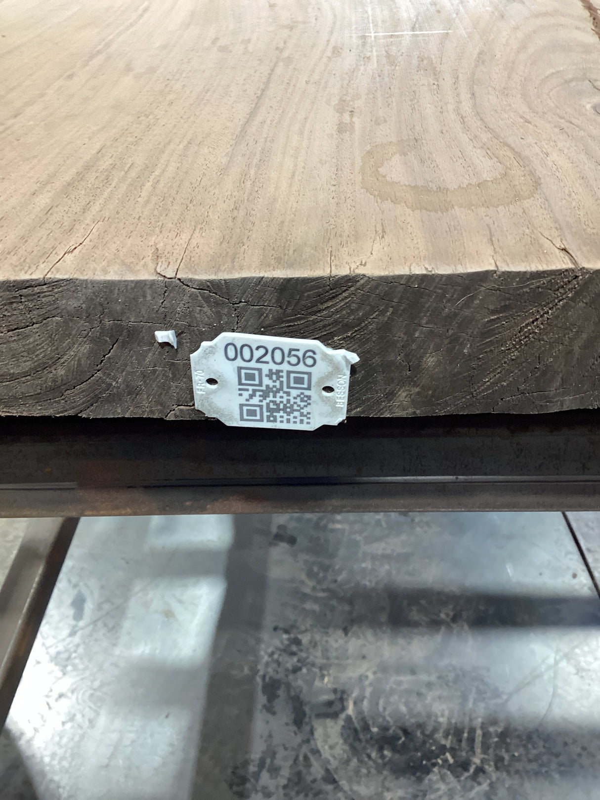 QR label attached to the walnut wood edge.
